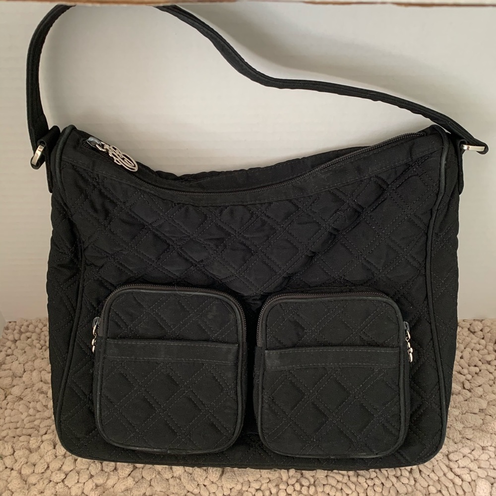 Vera Bradley black purse with yellow flower inside pattern